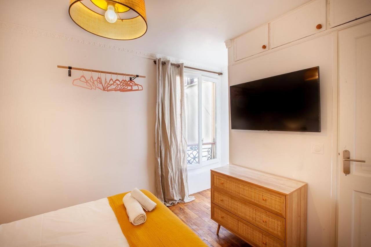 Appartement Eiffel Tower Rue Cler à Paris Extérieur photo
