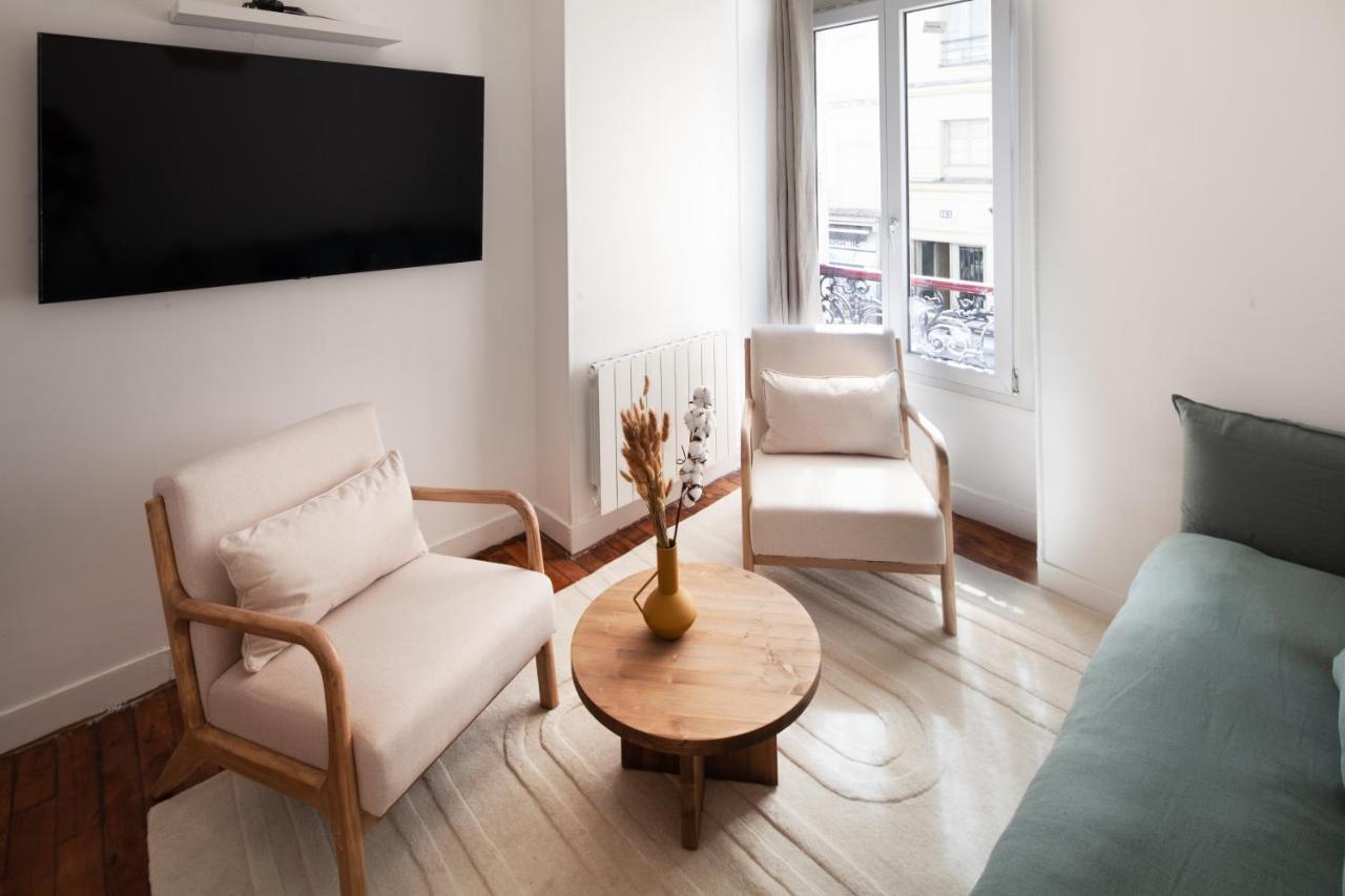 Appartement Eiffel Tower Rue Cler à Paris Extérieur photo